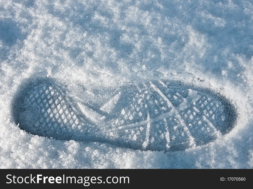 Detail of footprint in snow