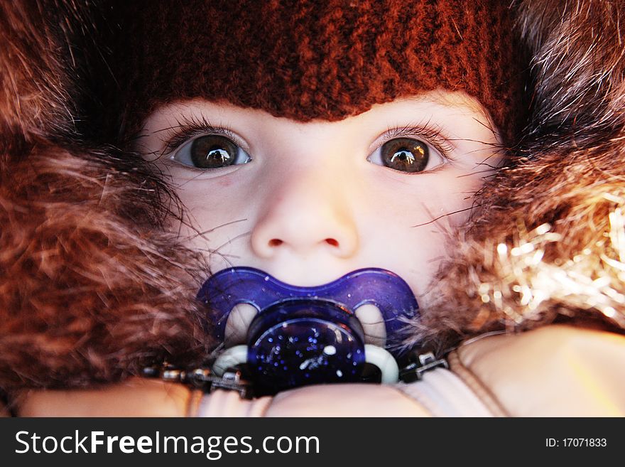 Baby in winter clothes with fur. Baby in winter clothes with fur