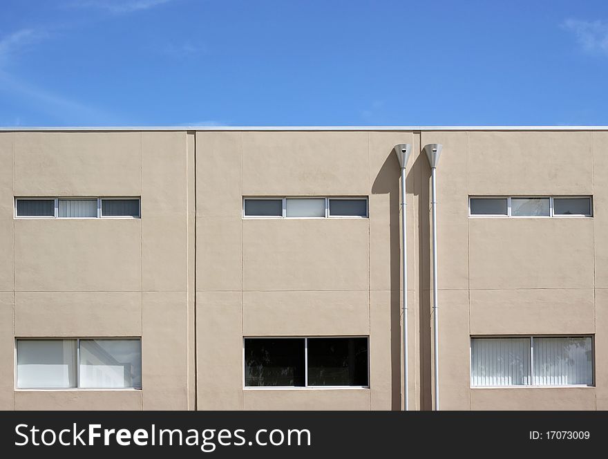 Modern Townhouse Building.  Adelaide, Australia.  3 joined townhouses with multiple levels - top windows are bathrooms, bottom windows are kitchens.