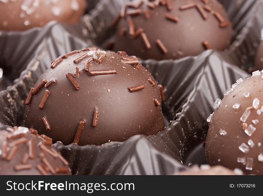 Truffle candy coated chocolate with decorative powdered for the occasion.