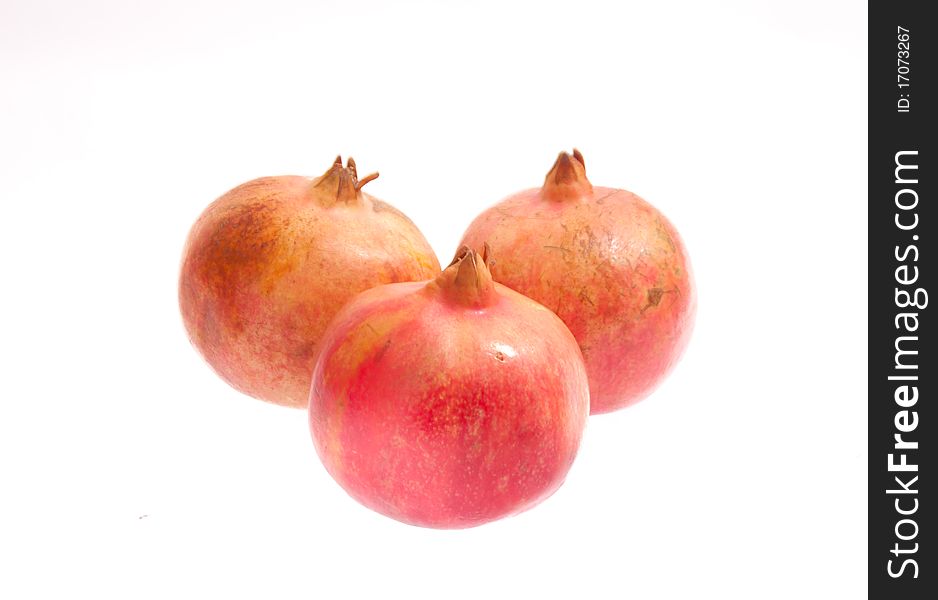 Photo of pomegranate. Isolated on white background