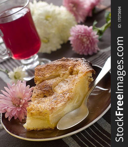 Slice of apple pie and cup of fruit tea. Slice of apple pie and cup of fruit tea