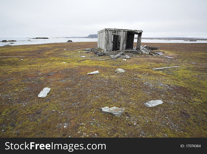 Old, abnandoned, wooden hut on tundra - Arctic, Spitsbergen