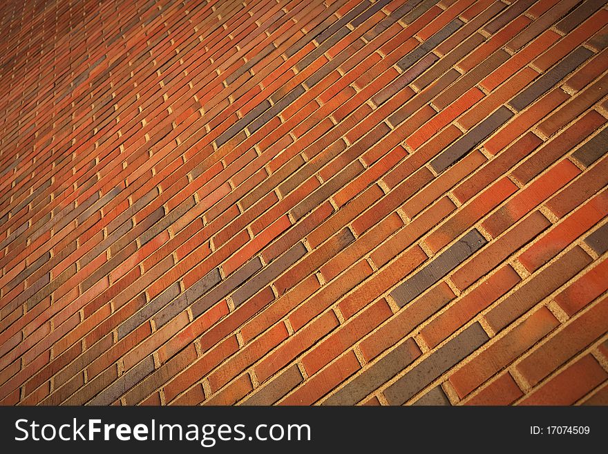 Red brick wall background close-up