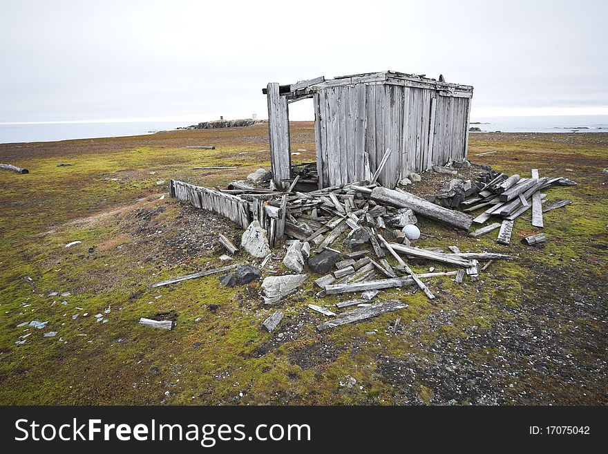 Old, abnandoned, wooden hut on tundra - Arctic, Spitsbergen. Old, abnandoned, wooden hut on tundra - Arctic, Spitsbergen