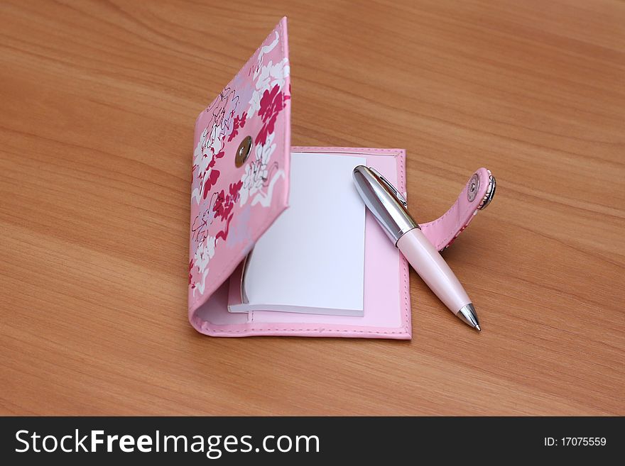 Lie on a wooden table, office supplies