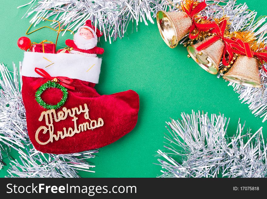 Christmas decoration objects on light green background. Christmas decoration objects on light green background