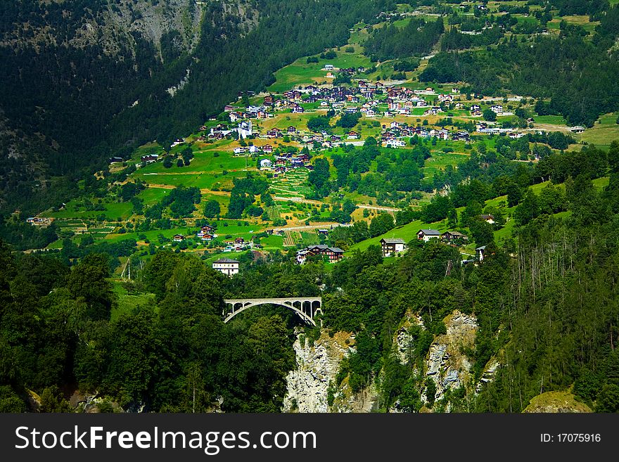 View of a village in the mountains of Switzerland. View of a village in the mountains of Switzerland