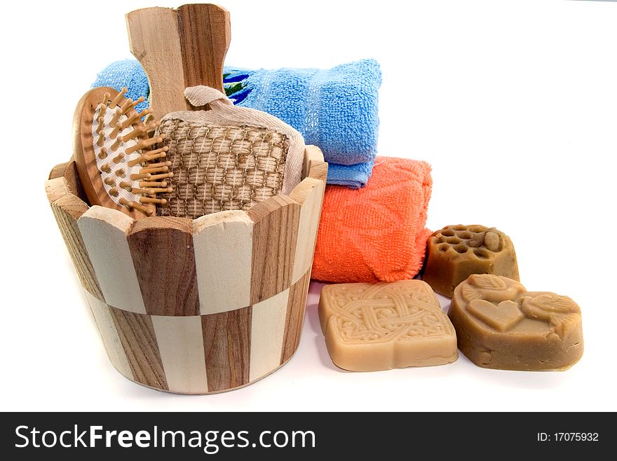 Soap and bath accessories on white background. Soap and bath accessories on white background