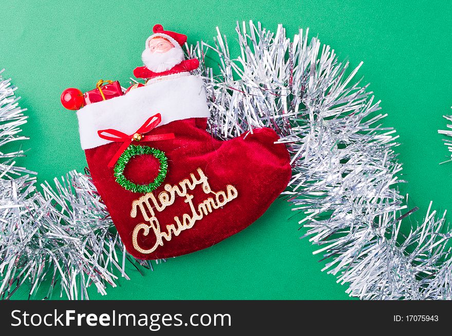 Christmas decoration objects on light green background. Christmas decoration objects on light green background