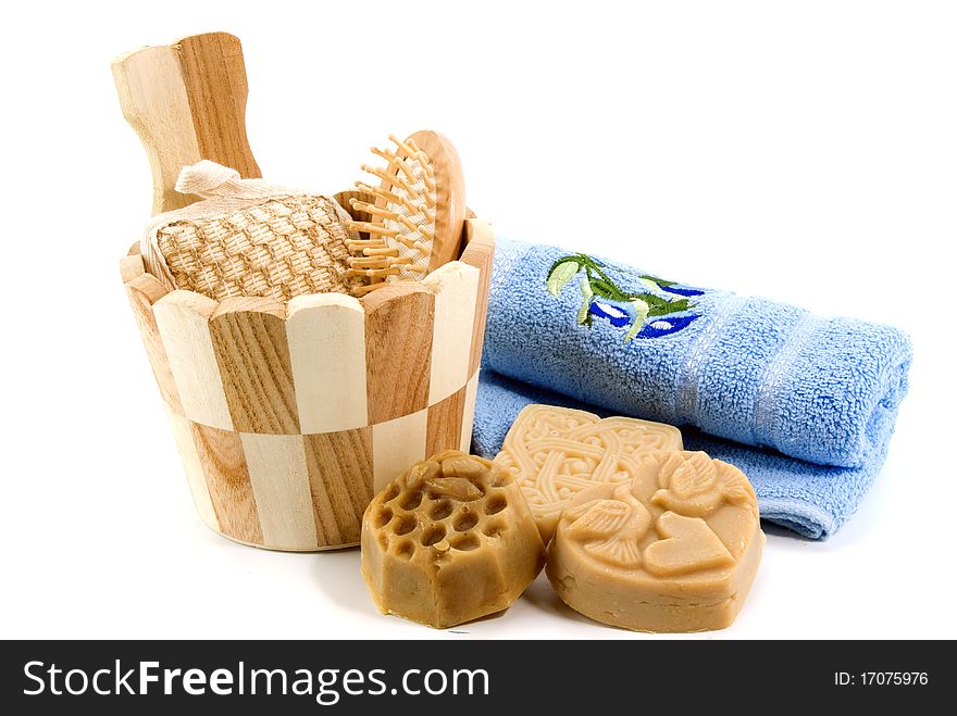 Soap and bath accessories on white background. Soap and bath accessories on white background