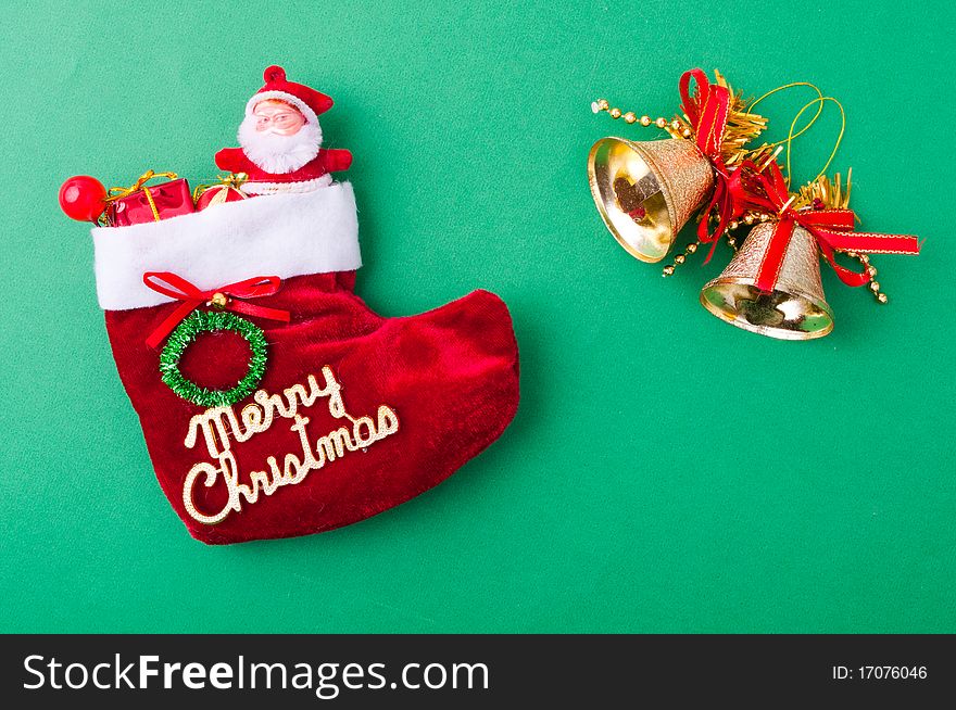 Christmas decoration objects on light green background. Christmas decoration objects on light green background