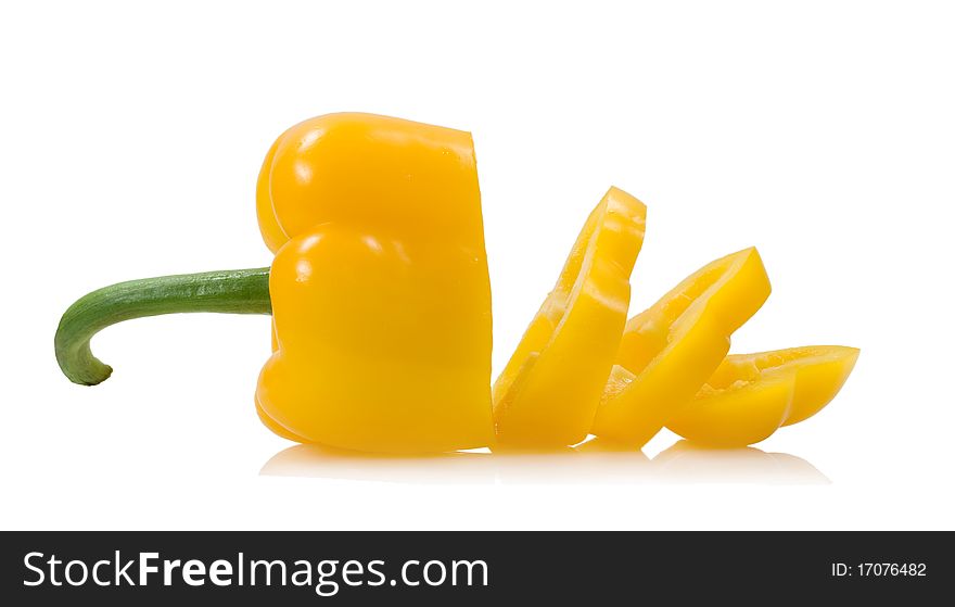 Yellow cropped pepper isolated on the white background