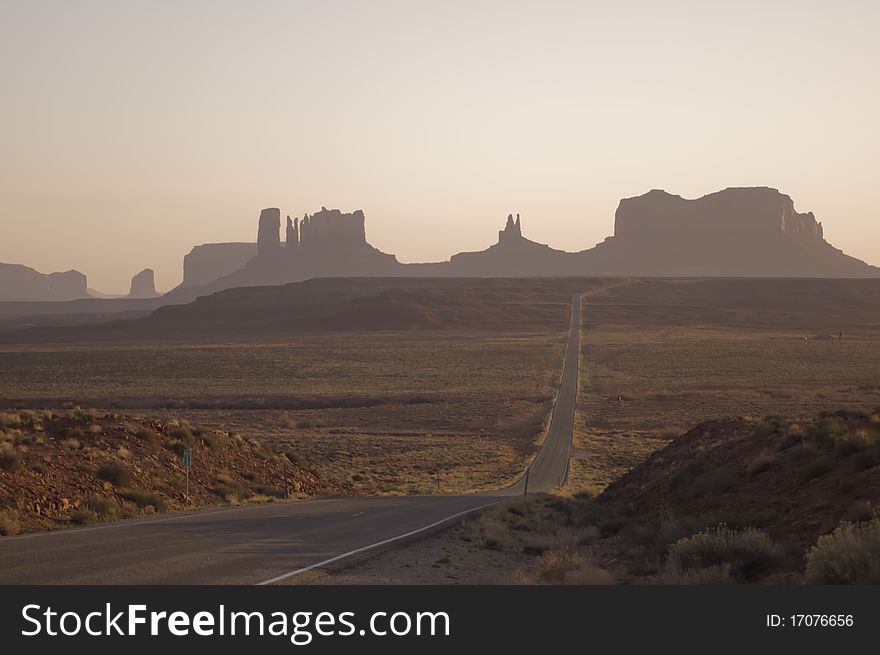 10 miles of empty road stretches across Monument Valley Utah. 10 miles of empty road stretches across Monument Valley Utah