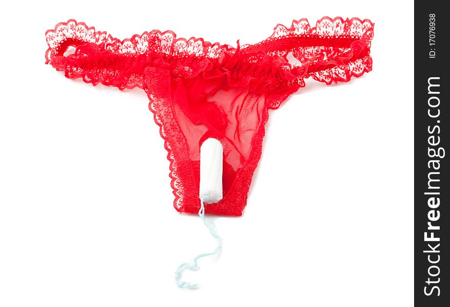 Ladies feminine hygiene product on red panties