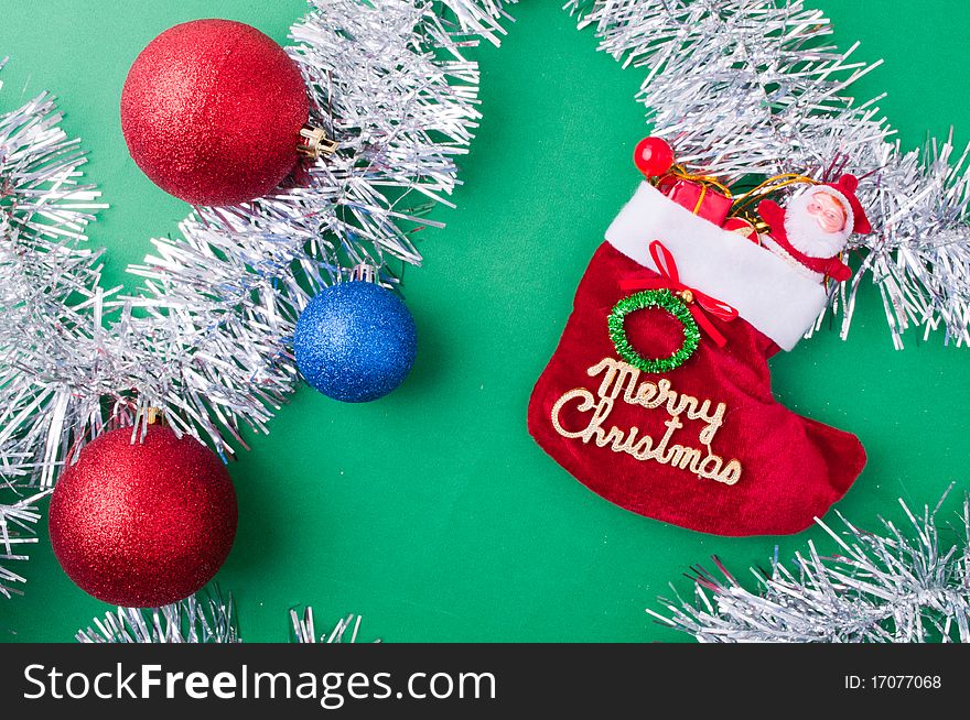 Christmas decoration objects on light green background. Christmas decoration objects on light green background