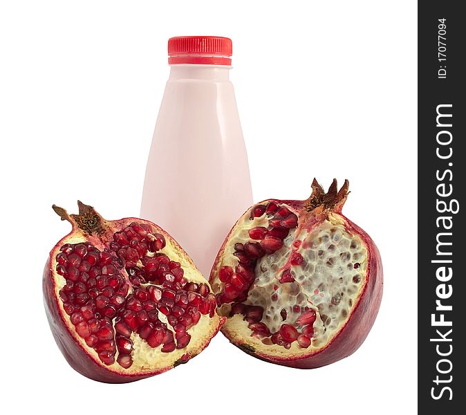 Bottle of yogurt and pomegranate on a white background