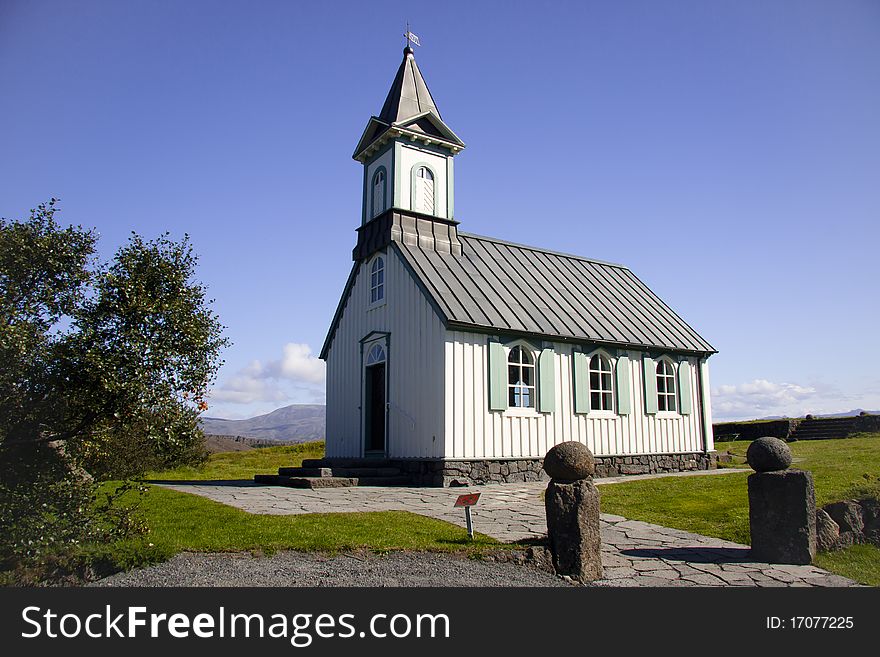 White church in Thingvellir summer time. Iceland. White church in Thingvellir summer time. Iceland.