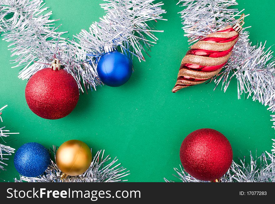 Christmas decoration objects on light green background. Christmas decoration objects on light green background