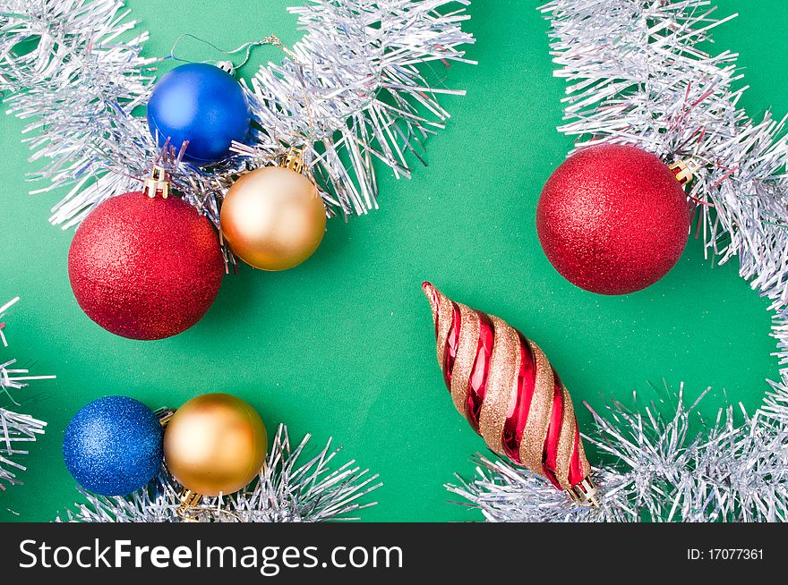 Christmas decoration objects on light green background. Christmas decoration objects on light green background