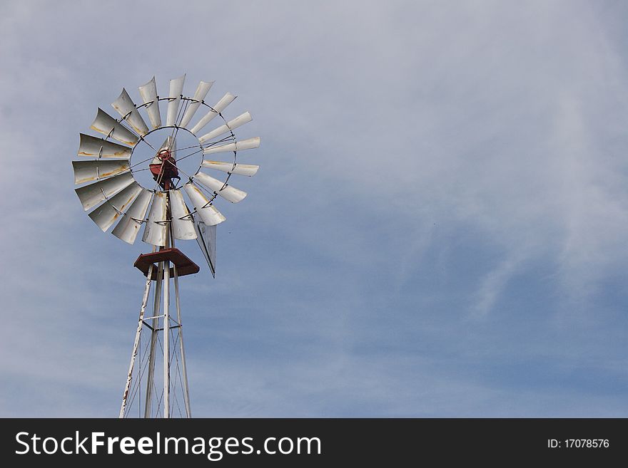 Windmill typically found on American farms in the 19th and 20th century. Windmill typically found on American farms in the 19th and 20th century