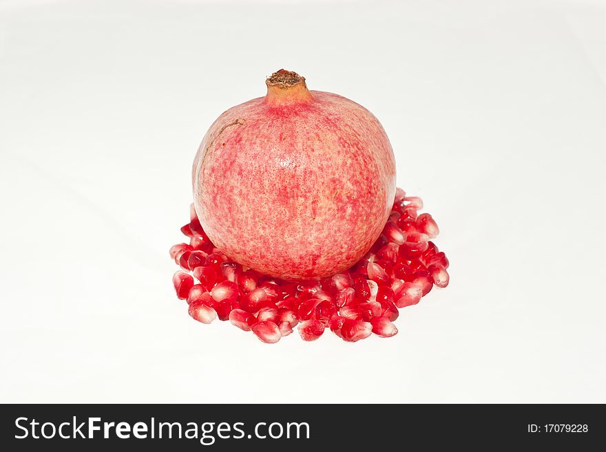 Tropical fruit pomegranate on white background