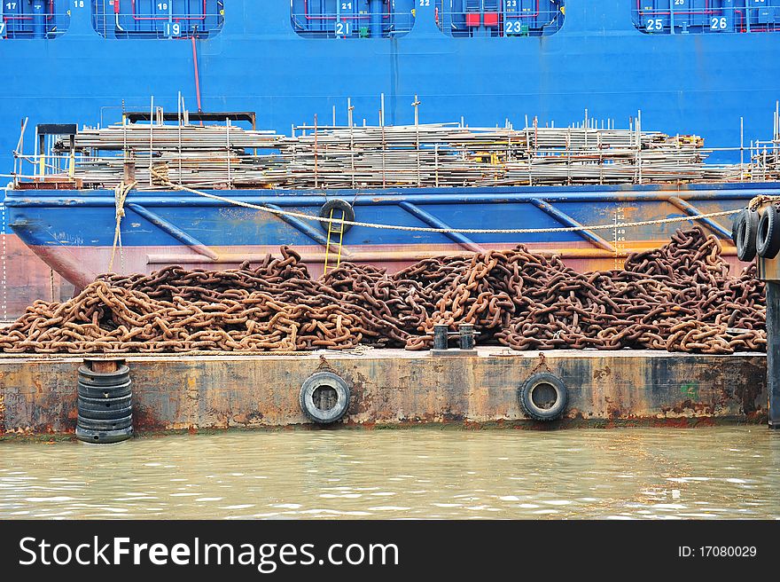 Barge Laden With Heavy Metal Chain At A Repair Yard