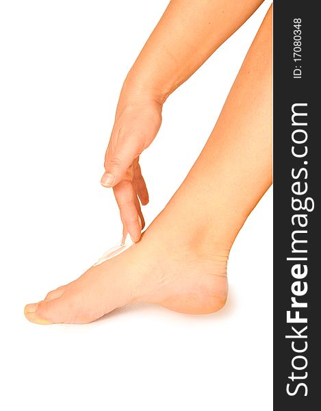 Foot care by applying creams. Foot care by applying creams