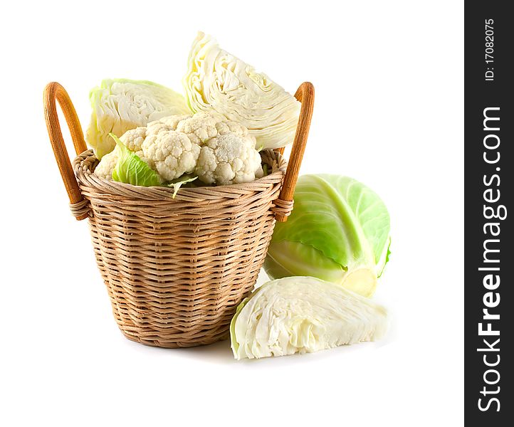 Cabbage in a basket. On a white background
