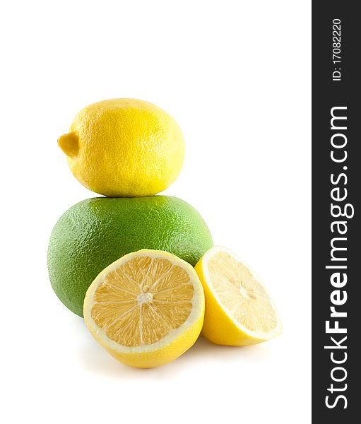 Lemons and grapefruits on white background