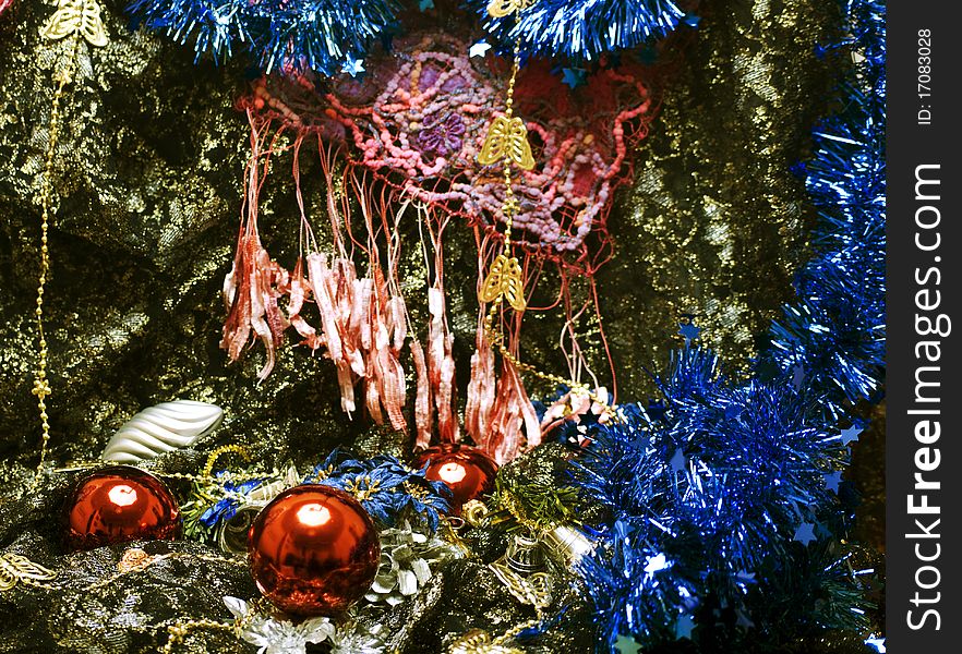 Different Christmas decorations on the sheer black material. Different Christmas decorations on the sheer black material