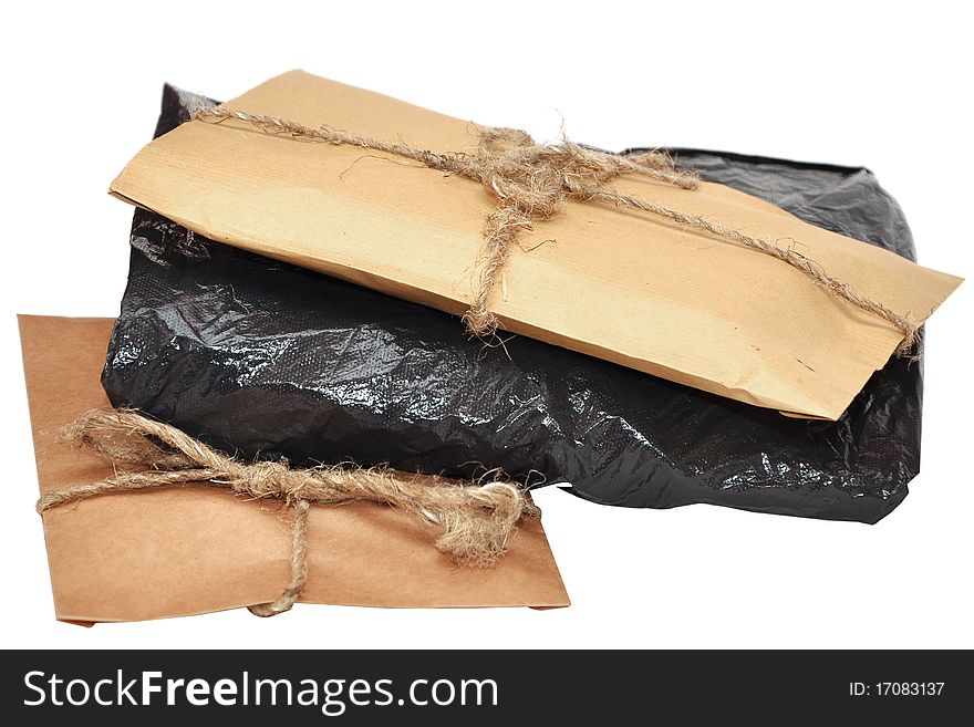 Brown paper parcels ready on isolated white background. Brown paper parcels ready on isolated white background