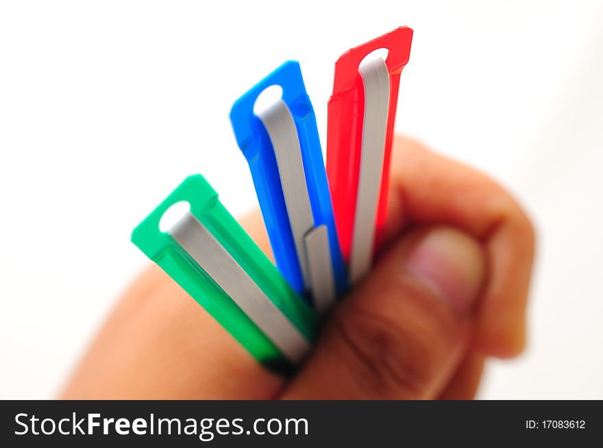 Paper Clips In Green, Blue And Red Color. Paper Clips In Green, Blue And Red Color