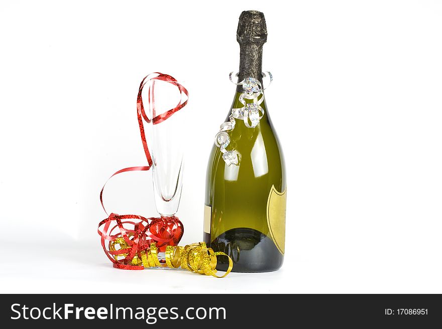 Bottle of champagne and flute  glass decorated with ribbons for christmas celebration. Bottle of champagne and flute  glass decorated with ribbons for christmas celebration