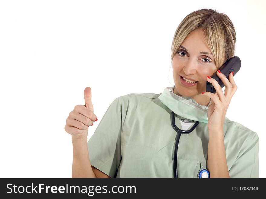 Smiling confident medical staff on the phone with a patient about test results. Smiling confident medical staff on the phone with a patient about test results