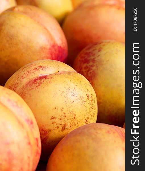 Ripe and sweet  peaches closeup