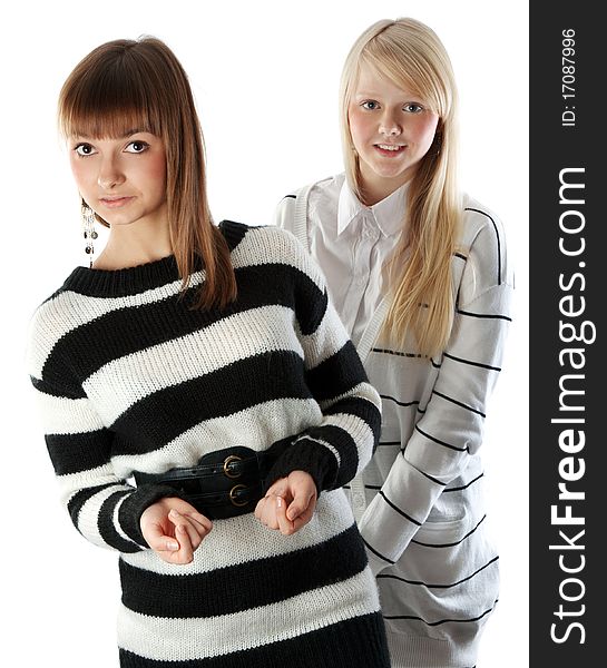 Portrait two girls of the blonde and brunettes insulated on white background