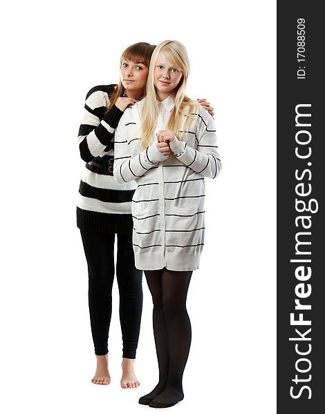 Portrait two girls of the blonde and brunettes insulated on white background