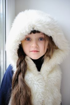 Adorable Small Girl In White Fur Hood Stock Photography Adorable Small Girl In White Fur Hood Stock Photography