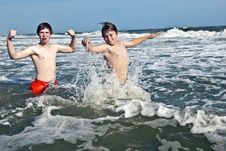 Boys Enjoying The Beautiful Ocean And Beach Stock Photo Boys Enjoying The Beautiful Ocean And Beach Stock Photo