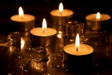 Candles With Melting Ice Royalty Free Stock Photography