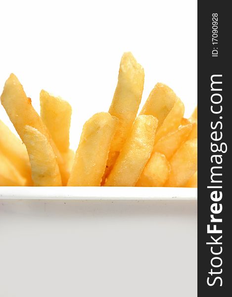 Closeup of french fries in a plastic container