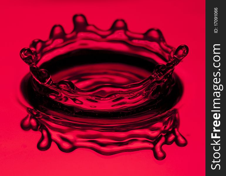 Water splashing with red background. Water splashing with red background