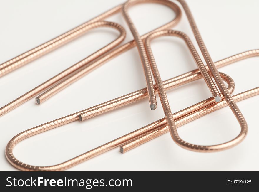 Three fasteners isolated on a table top.