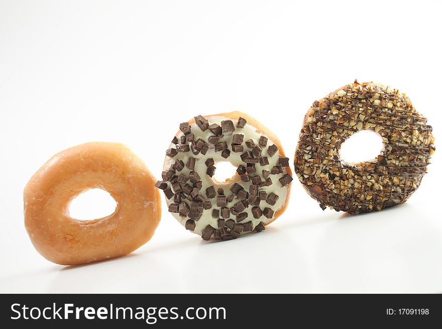 Assorted Donuts On A White Background