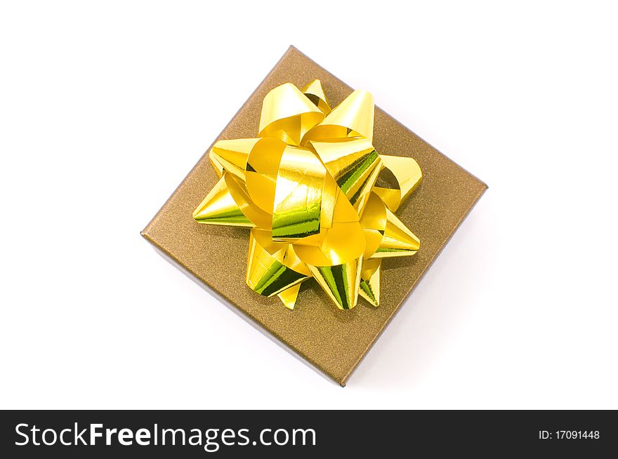 Christmas gift-box on white background, with golden ribbon