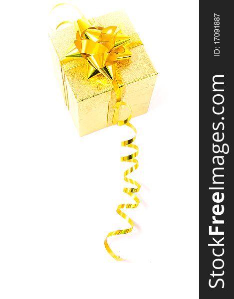 Christmas golden gift-box on white background, with golden ribbon