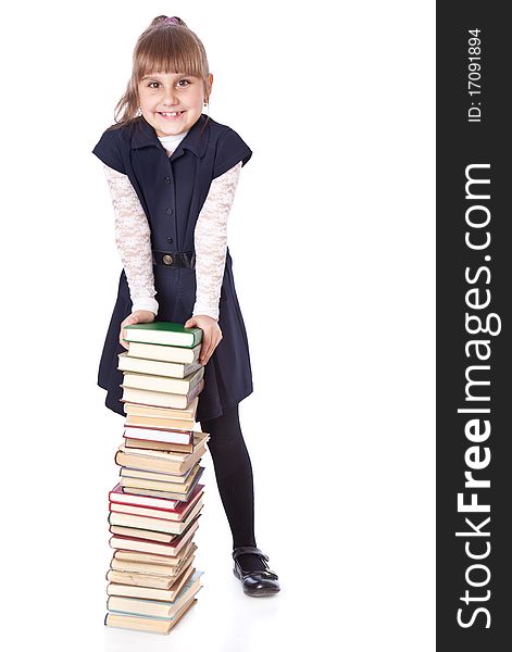 Schoolgirl witn books. Isolated on white background