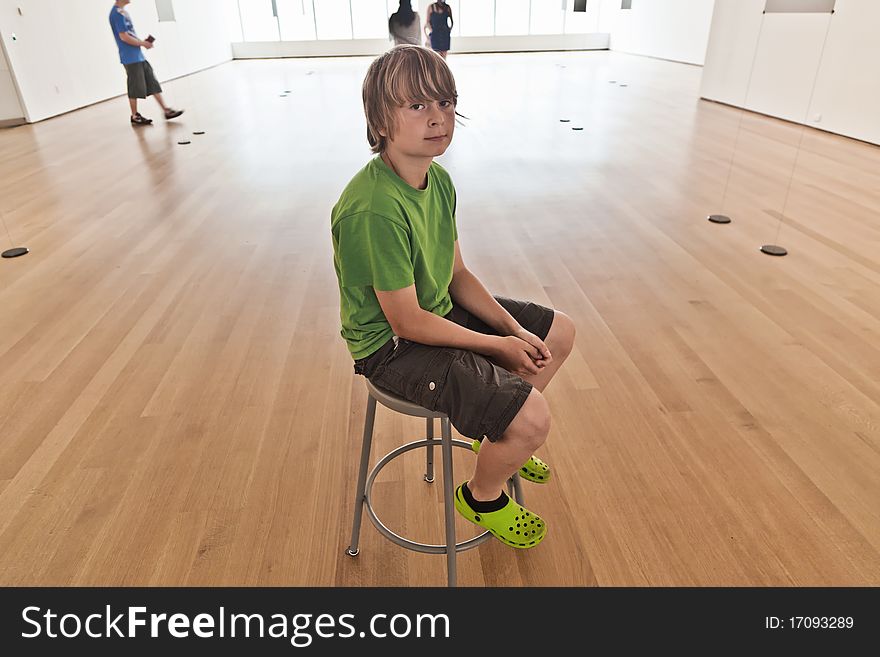 Portrait of a cute boy in the museum