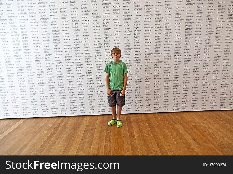 Portrait of a cute boy in the museum